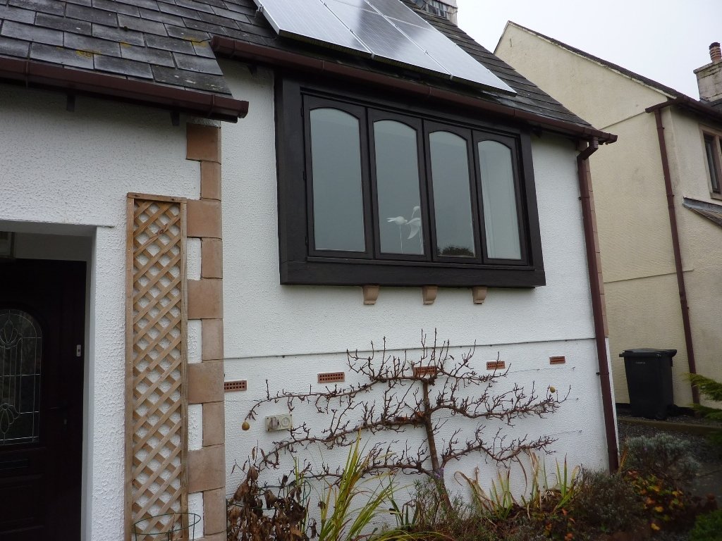 Hardwood crescent head doubleglazed replacement windows in Devon