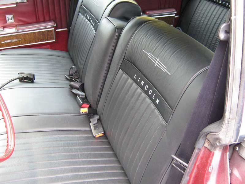 black leather seating upholstery and embroidery