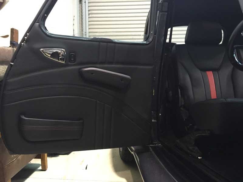 black custom door paneling hot rod