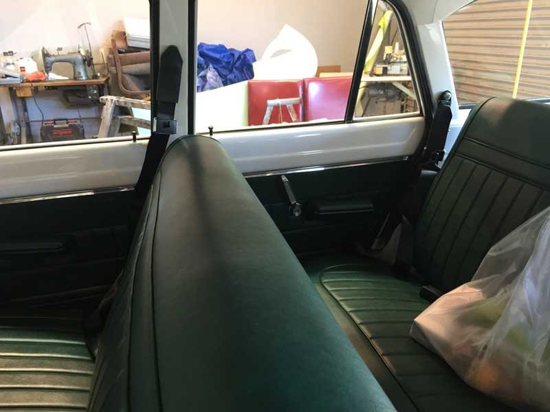 forest green rear bench seating in custom car
