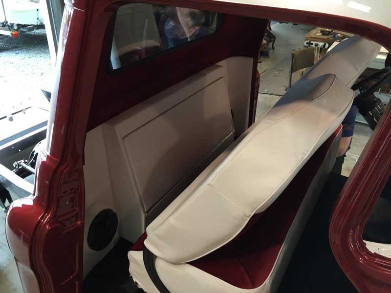 crimson and cream bench seating in custom car 2