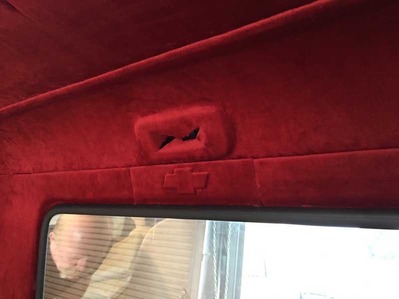 Chevy embalm in interior crimson upholstery