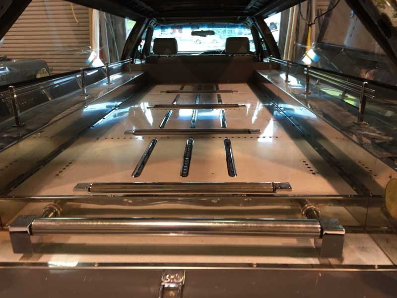 before interior of silver hearse