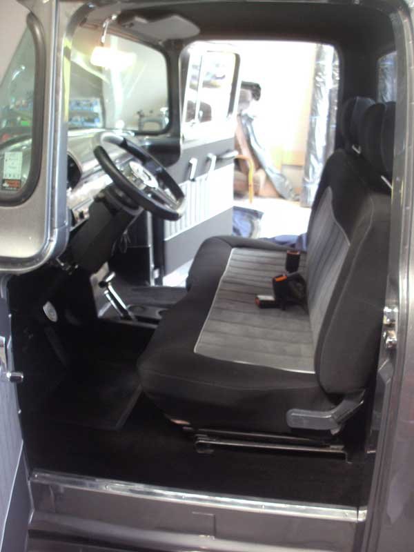 gray and black drivers seat in vintage pickup