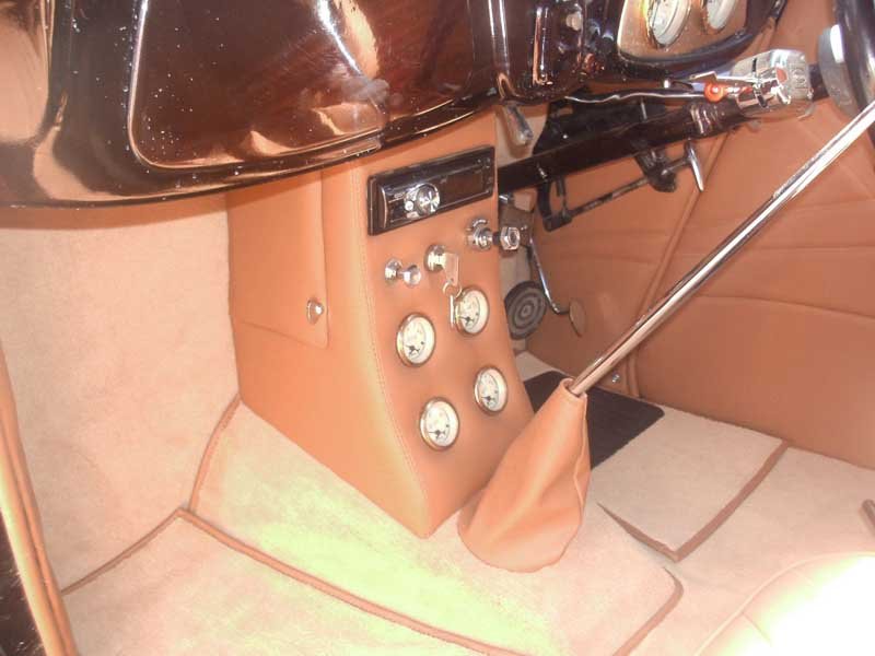 automotive instrument panel in tan leather