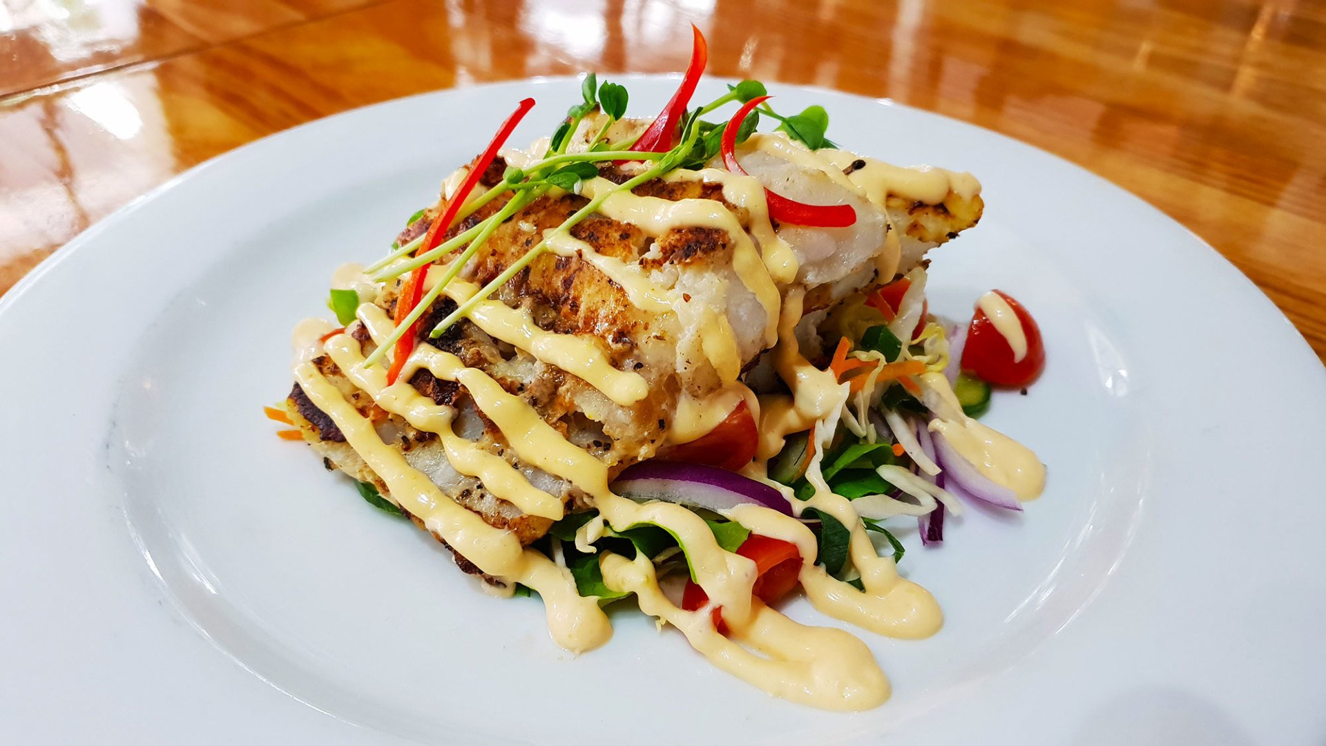 Aussie Grilled Cod on Garden Salad with Citrus Aioli