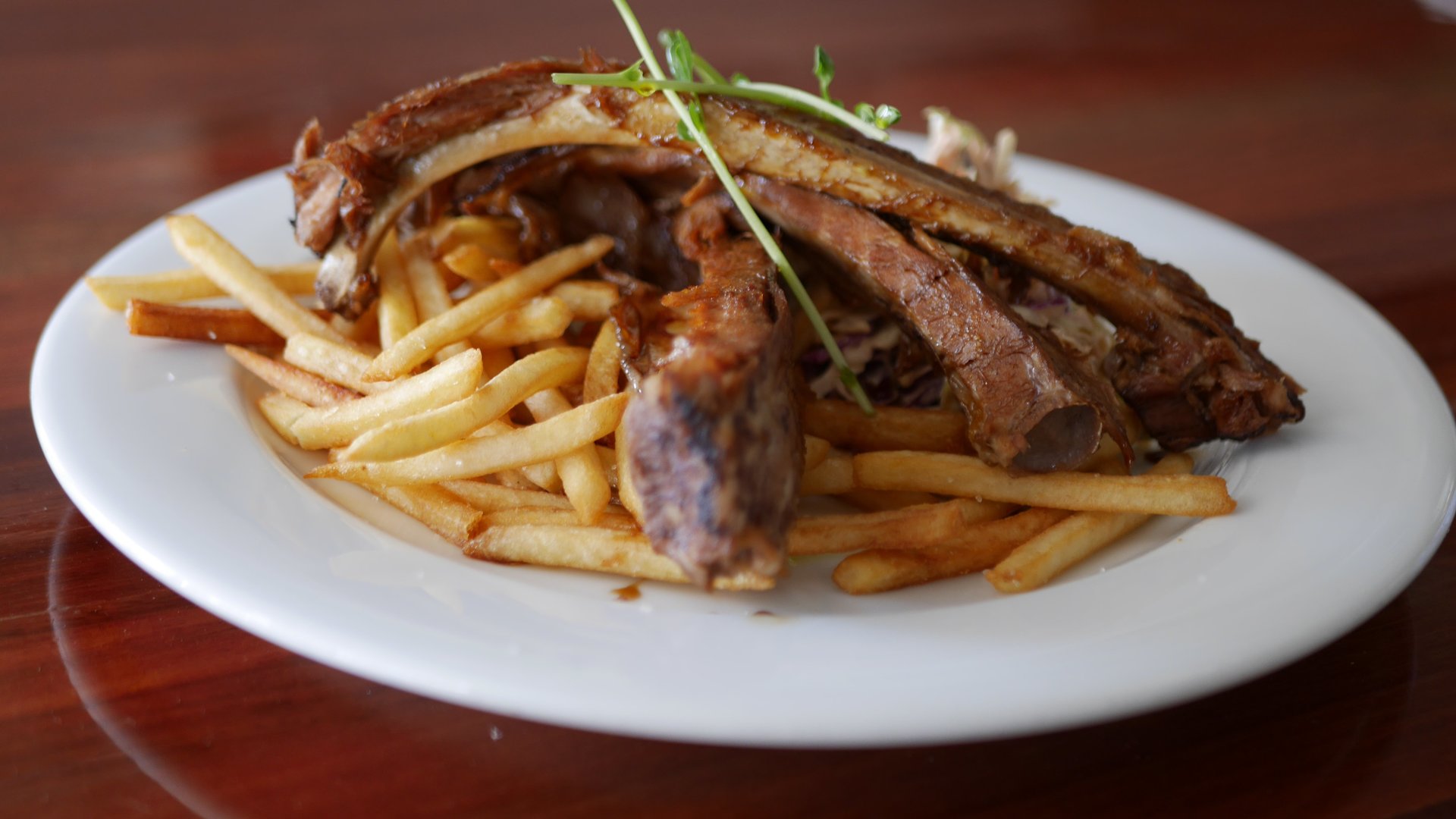 Japanese Yakitori - Marinated Pork Ribs with Slaw and Fries.
