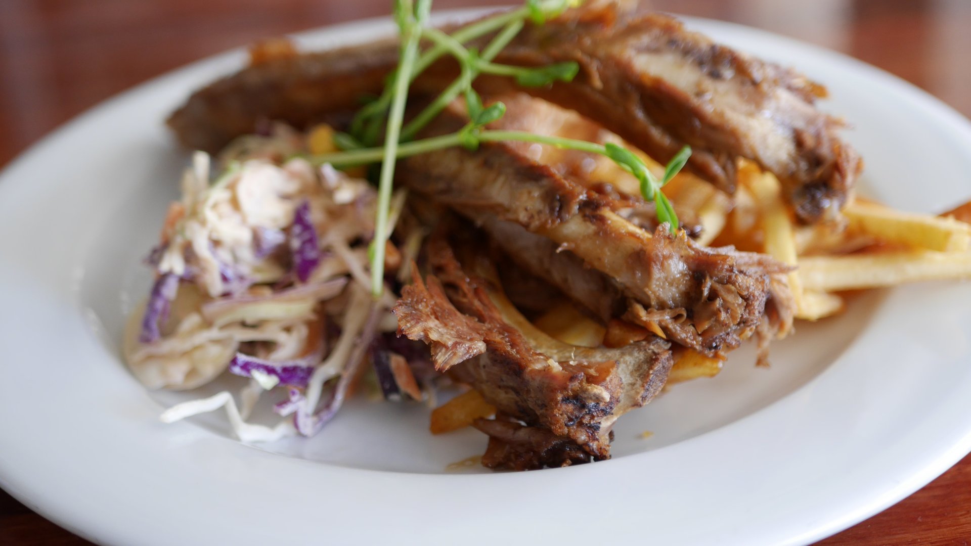 Japanese Yakitori - Marinated Pork Ribs with Slaw and Fries.