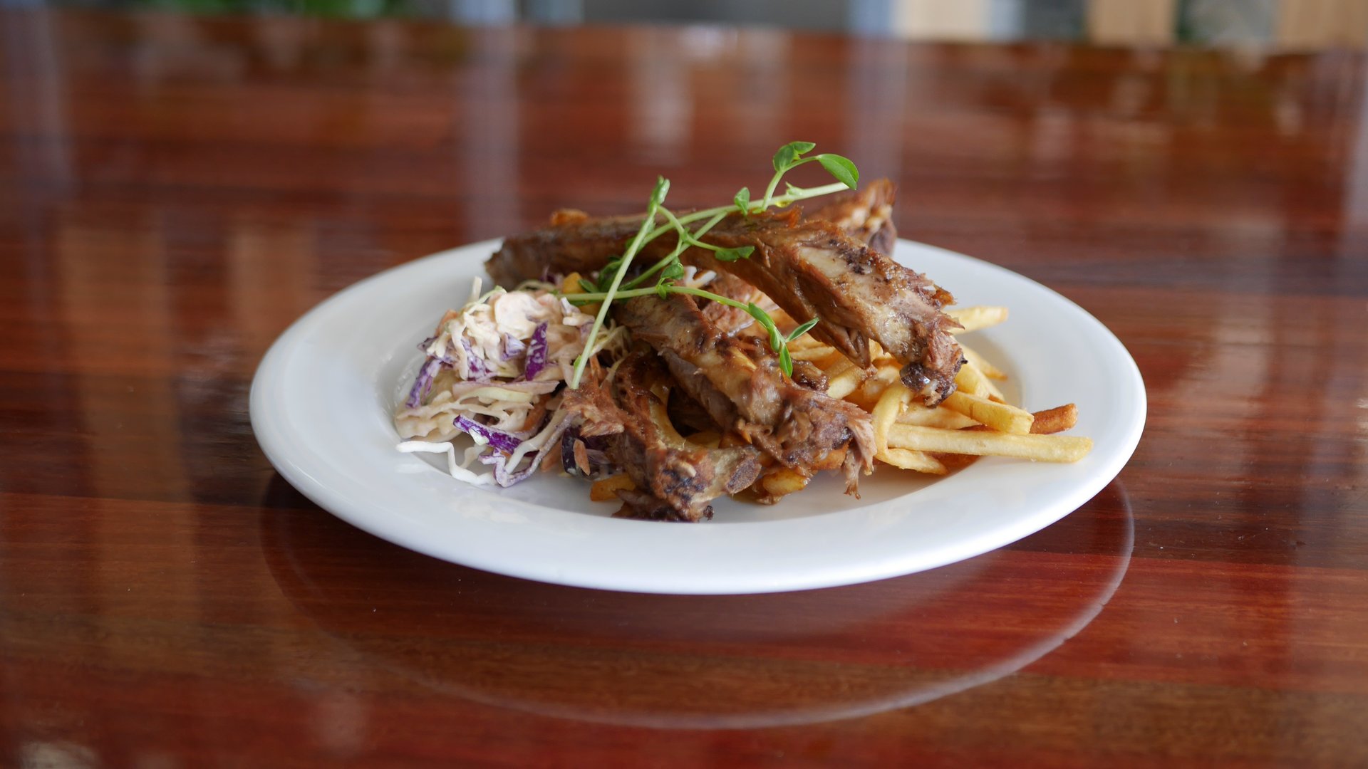 Japanese Yakitori - Marinated Pork Ribs with Slaw and Fries.