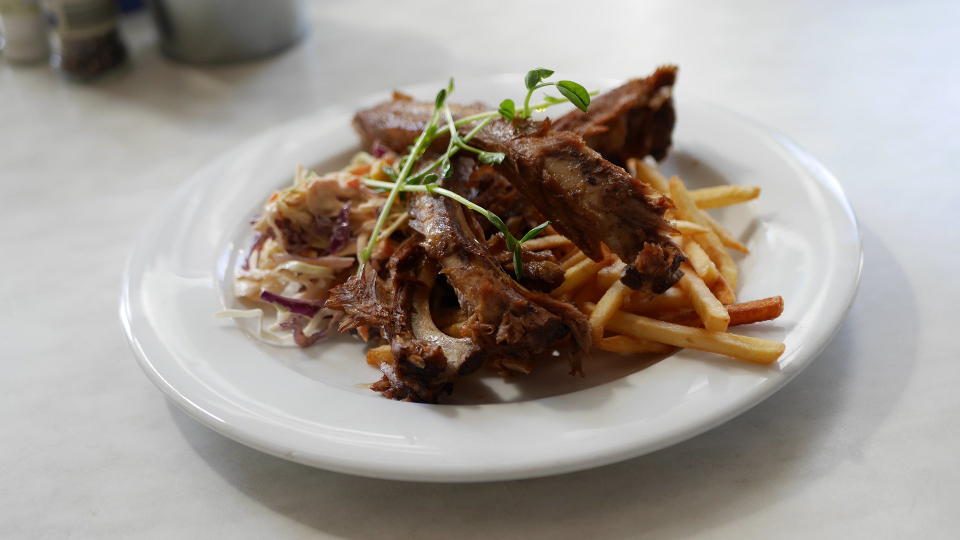 Japanese Yakitori - Marinated Pork Ribs with Slaw and Fries.