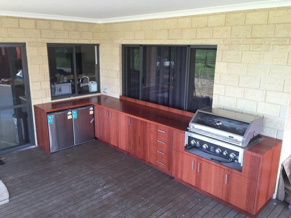 back patio with grill and custom cabinetry