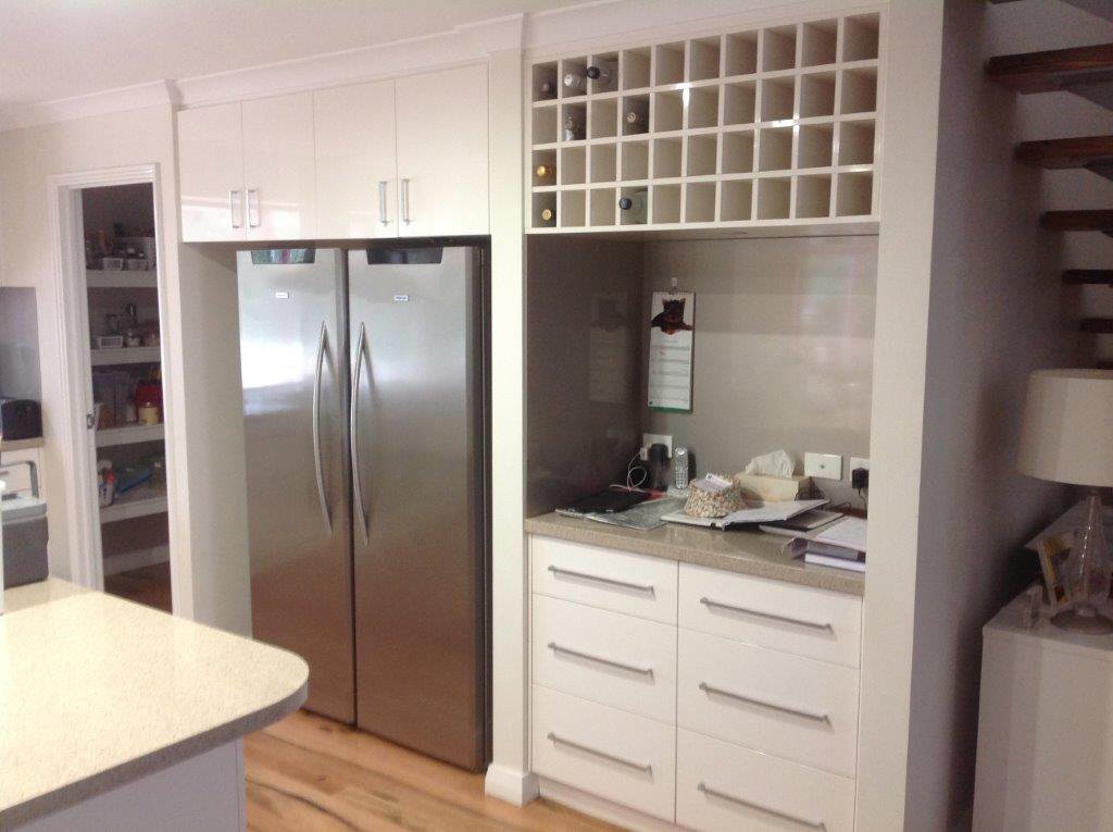 bathroom with wooden cabinets