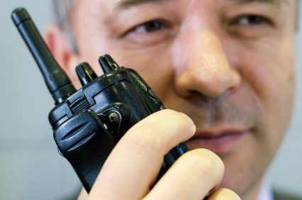 Security professional connected with technology