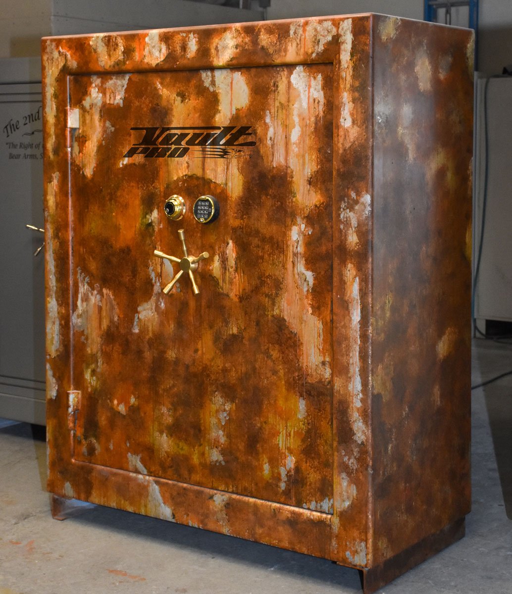 A rusty safe with the word eagle on it