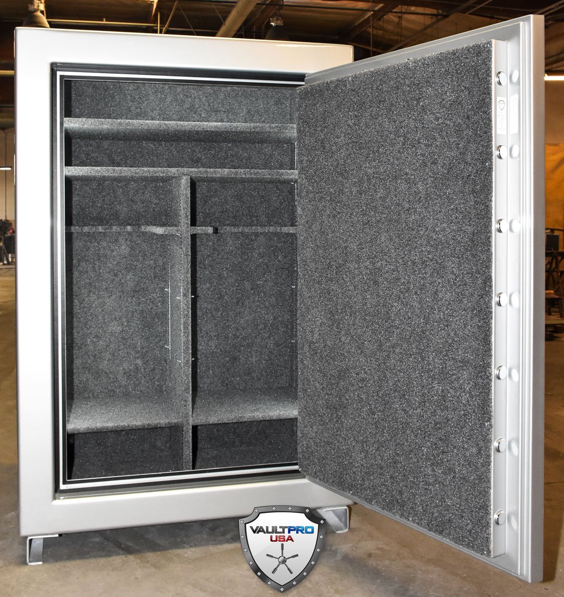 big gun safe interior with rifle rack and shelves