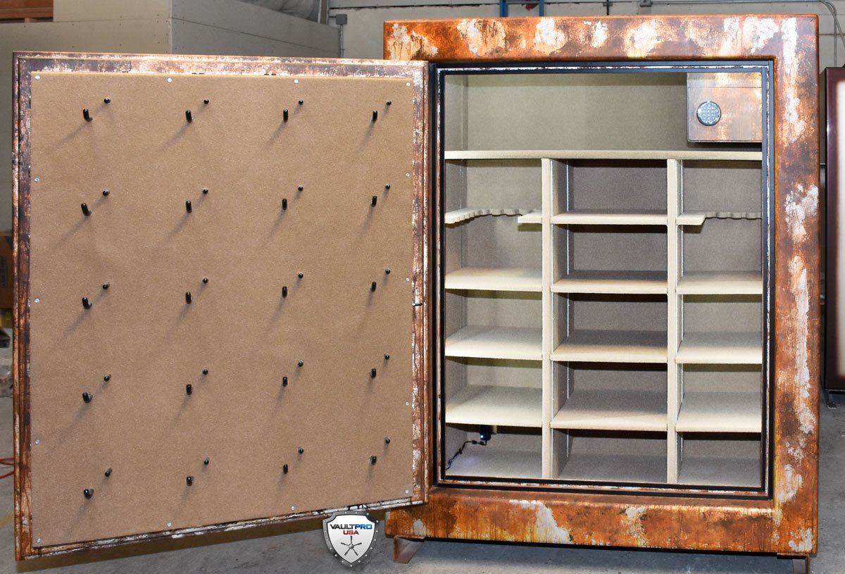 A rusty safe with the door open and shelves inside