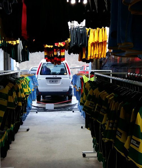 commercial laundry stacked on shelves